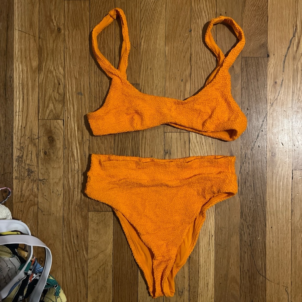 It’s now cool orange bikini size Medium